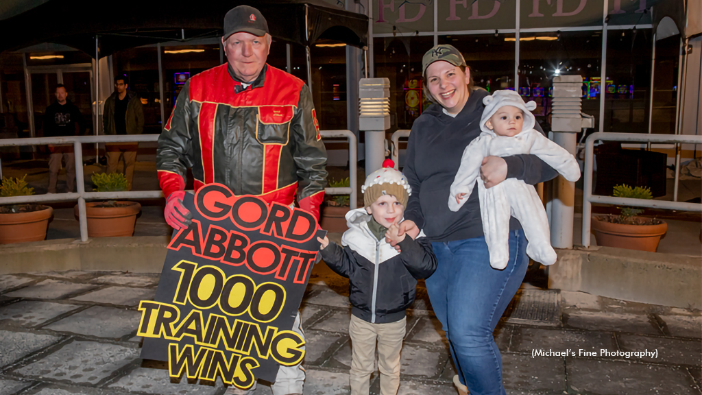 Gord Abbott with family in the Fraser Downs winner's circle after his 1,000th training win