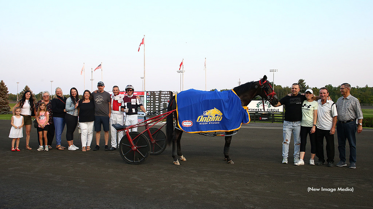 T H McMurry in the winner's circle at Woodbine Mohawk Park