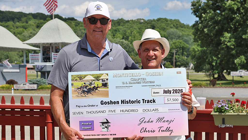 Chris Tully presents a USHWA donation to Goshen Historic Track's Steve Jones