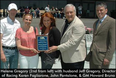 Gregory Receives Award Of Merit