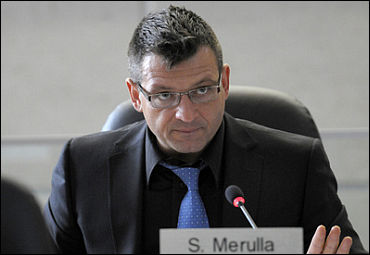 Merulla Takes Bold Shot At The OLG