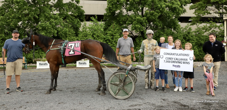 Clan Callahan gathers in the Harrah's Philadelphia winner's circle after Corey Callahan notched his 7,000th driving win