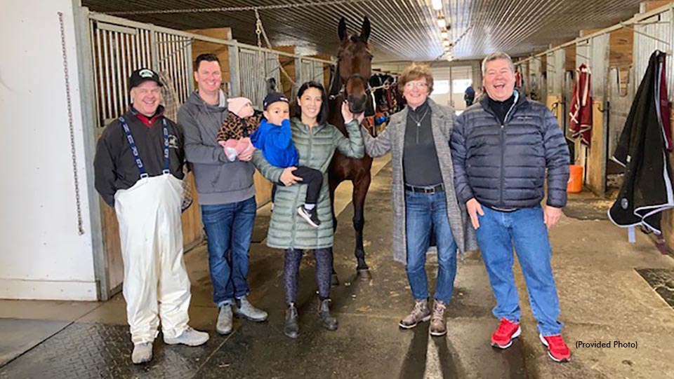 The Campbell family visiting Mappos Lion at the Paul MacDonell Stable in Ontario