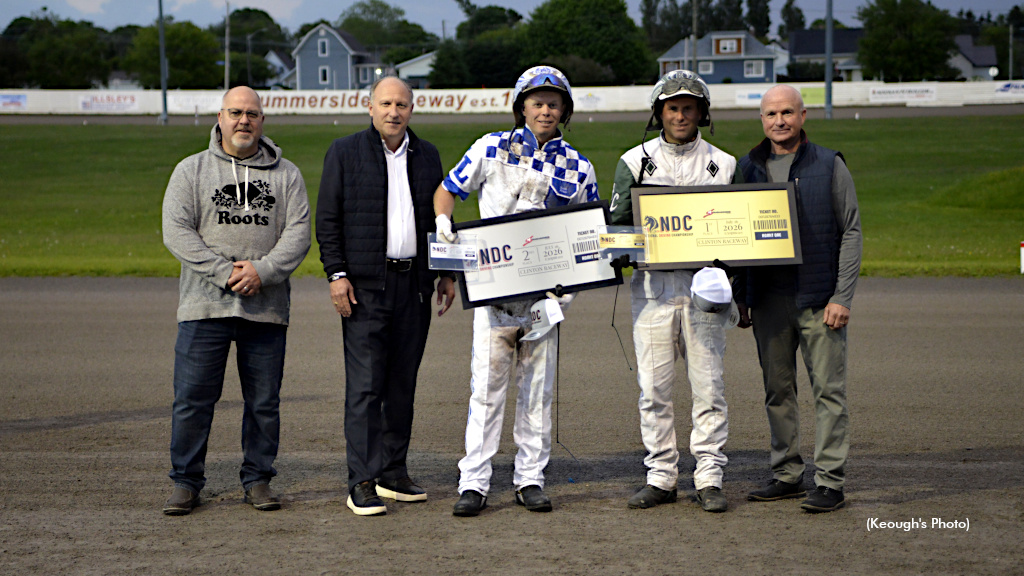 Marc Campbell and Keith Legge accept their commemorative NDC tickets