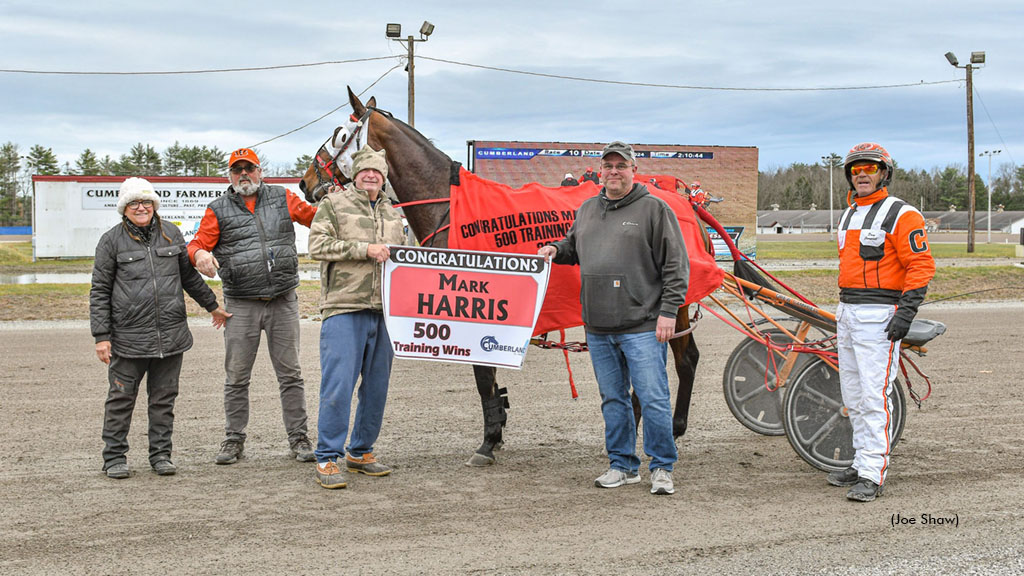 Cumberland Raceway makes a winner's circle presenation to trainer Mark Harris