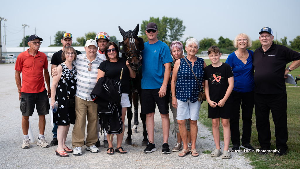 Marvin Hagler with winning connections and family and friends of the late Bob McIntosh