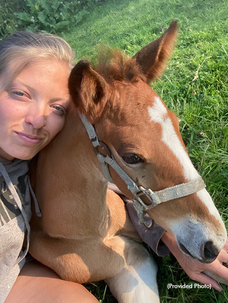 Michelle Olson and a foal