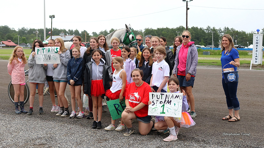 Putnams Storm joined by Camp Kippewa campers in the winner's circle at Cumberland