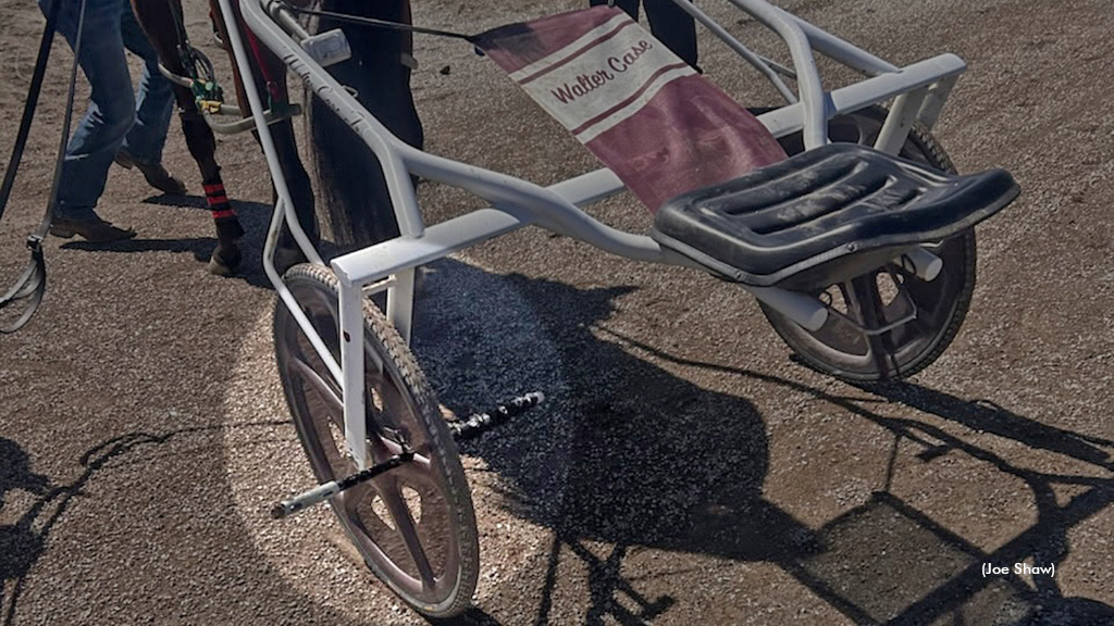 Headpole in the spokes of Walter Case's racebike