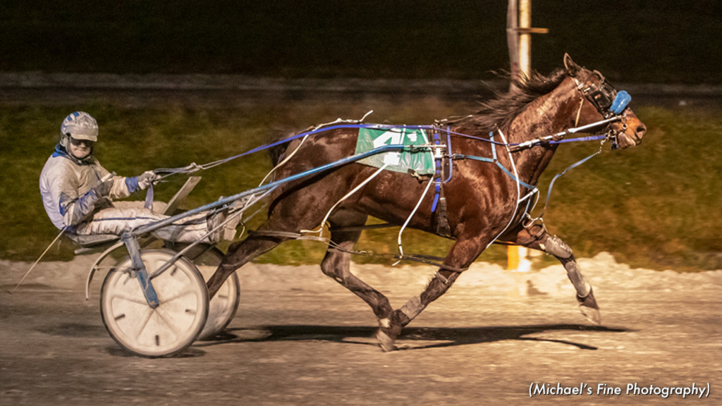 Hurried Romance and Rod Therres braving the elements at Fraser Downs