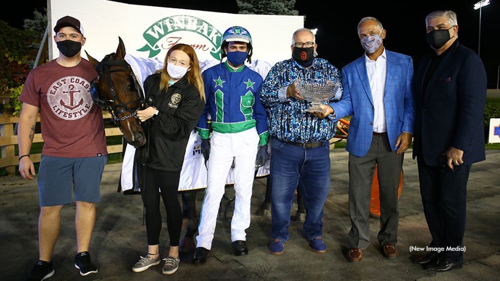 Brad Grant in the Mohawk winner's circle with 2020 Mohawk Million winner Venerate