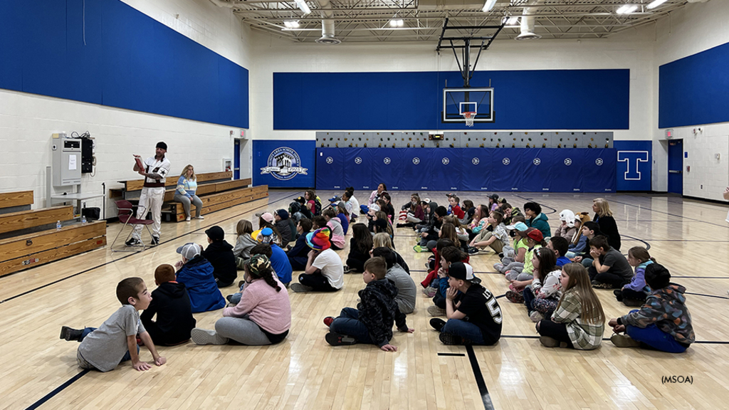 Dan Rawlings reading to kids