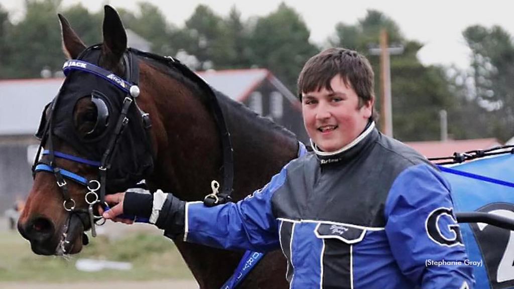 Zack Gray with a Standardbred at First Tracks Cumberland