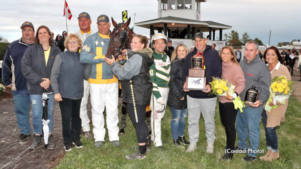 Ron Burke in the 2021 Little Brown Jug winner's circle