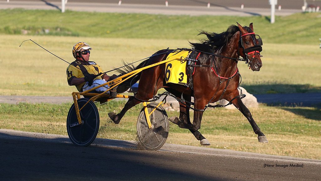 Moment Is Here winning at Woodbine Mohawk Park