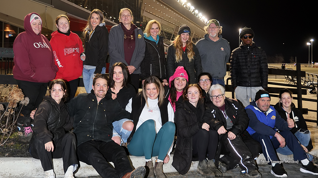 A group of Standardbred caretakers at Woodbine Mohawk Park