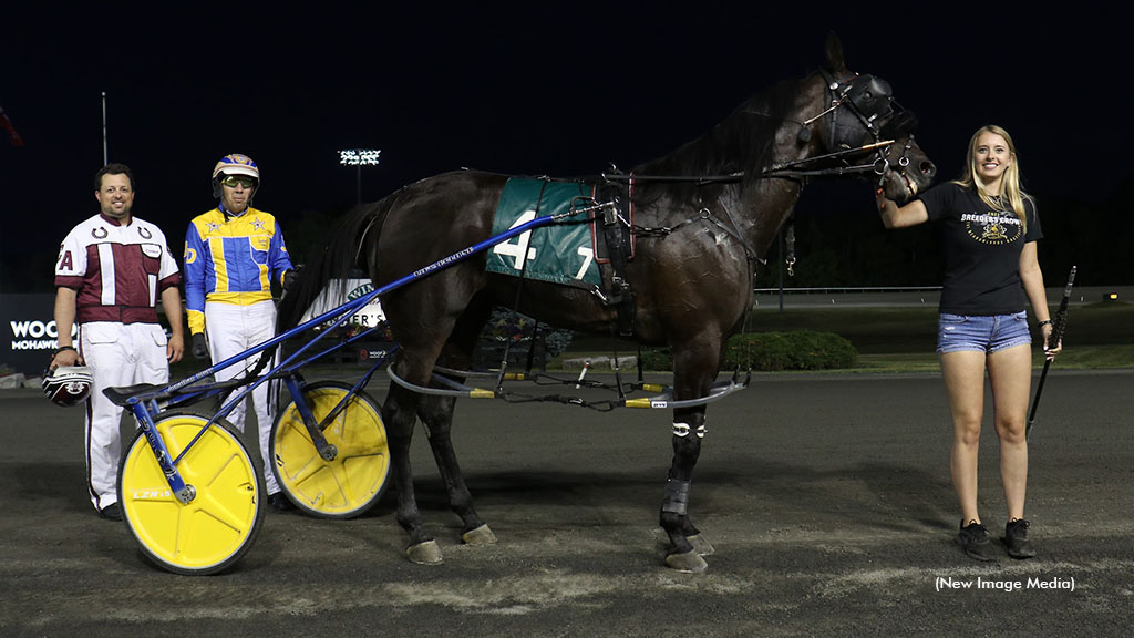 Trainer Carmen Auciello in the winner's at Woodbine Mohawk Park