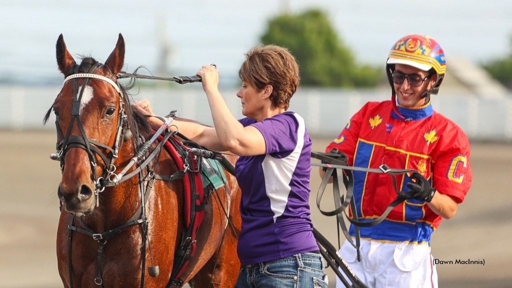 Brett Clow all smiles after his first driving win