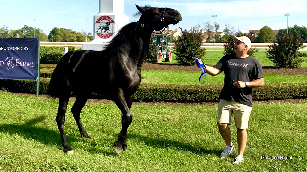 Jujubee and Greg Wright Jr. at The Red Mile after his Kentucky Futurity win