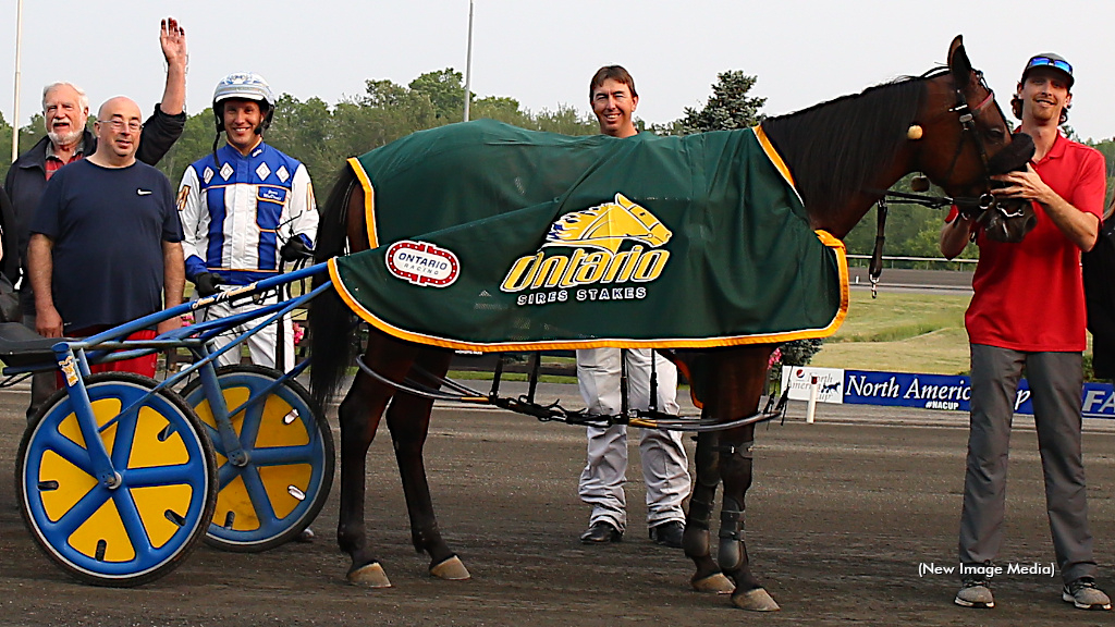 Century Jamila after an Ontario Sires Stakes win for driver James MacDonald and trainer Shawn Steacy