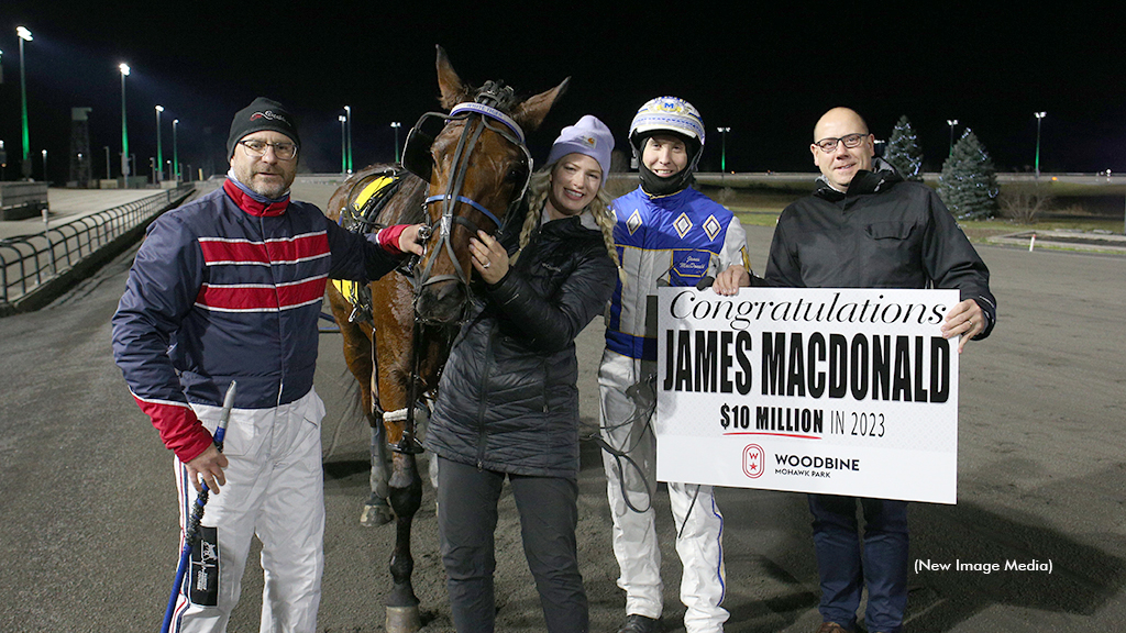 James MacDonald honoured in the Woodbine Mohawk Park winner's circle for his $10 million season