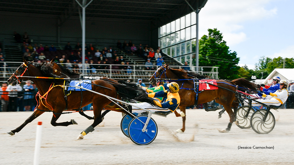 Heavy Dude E and driver Randy Waples winning at the Legends Day Trot