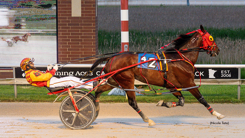 Driver Bryan Quevedo and Robbie Burns N winning at Running Aces