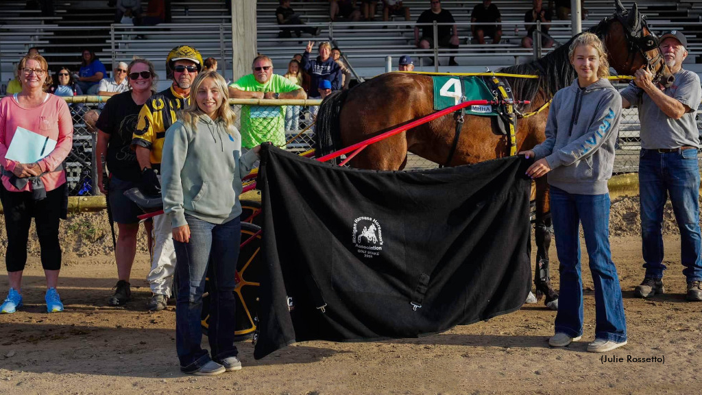 Tim Roach celebrates his 1,000th training win