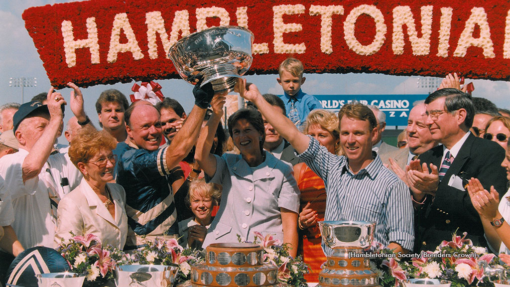 Mal Burroughs (in blue and tan driving colours) after winning the 1997 Hambletonian