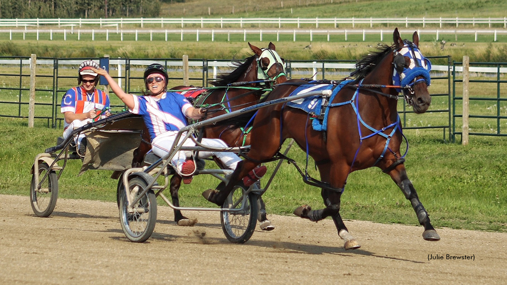 Yenoh Who and Alivia Kettleson winning the Battle Of The Backstretch exhibition race