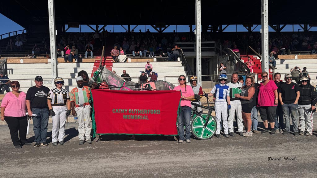 Seal Oneill and Lauren Harmon in the Shenandoah Downs winner's circle