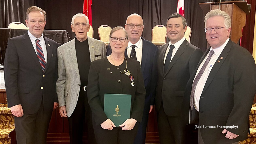 Gayle Ecker receiving the King Charles III Coronation Medal