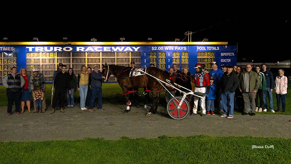 American Risk in the Truro Raceway winner's circle on opening night of the 2025 season