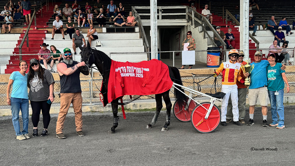 Kats Fancy in the winner's circle at Shenandoah Downs