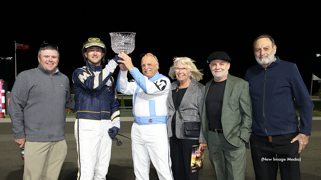 The connections of Metro Pace champion Beau Jangles in the winner's circle at Woodbine Mohawk Park