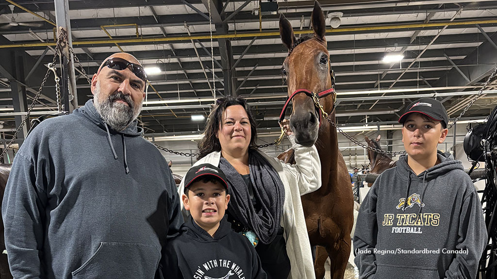 Win a Share of a Racehorse contest winner with his family