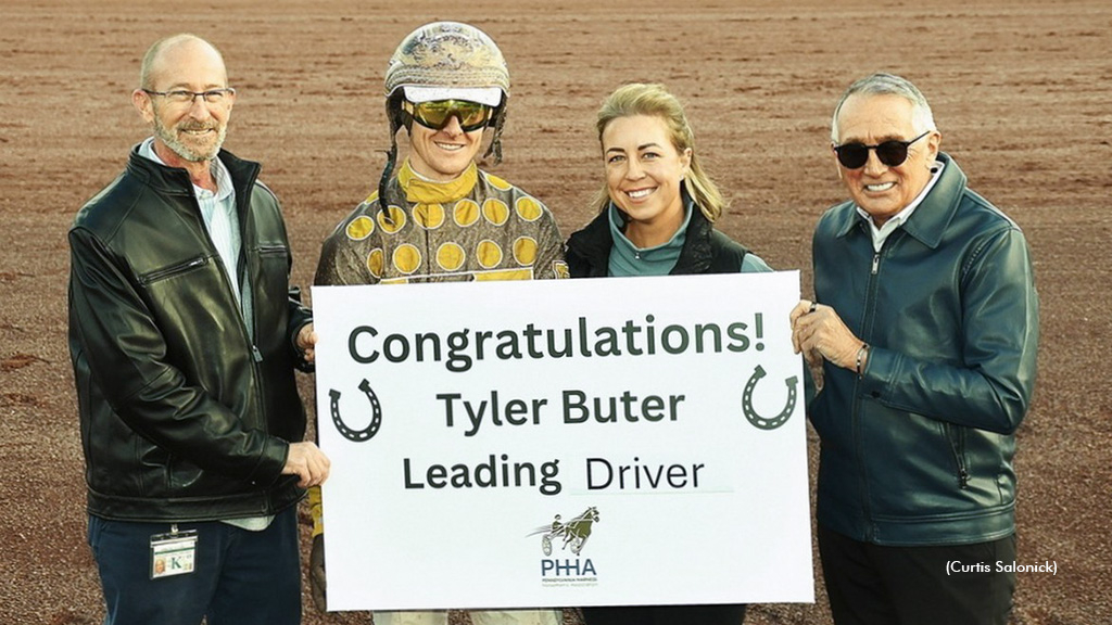 Tyler Buter receives a presentation