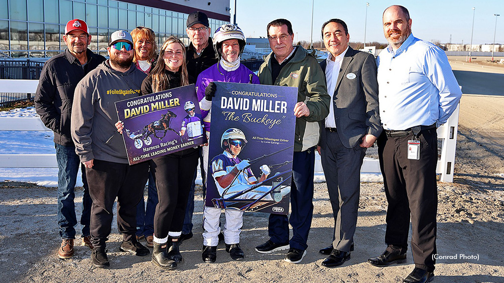 David Miller receiving a presentation