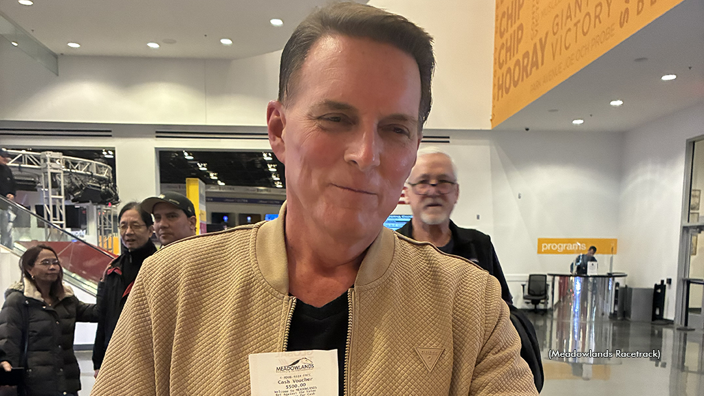 John Skladany with his winning ticket