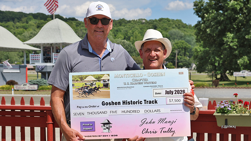 Chris Tully presents a USHWA donation to Goshen Historic Track's Steve Jones