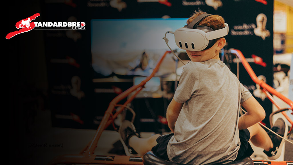 An image of a child using the harness racing virtual reality simulator