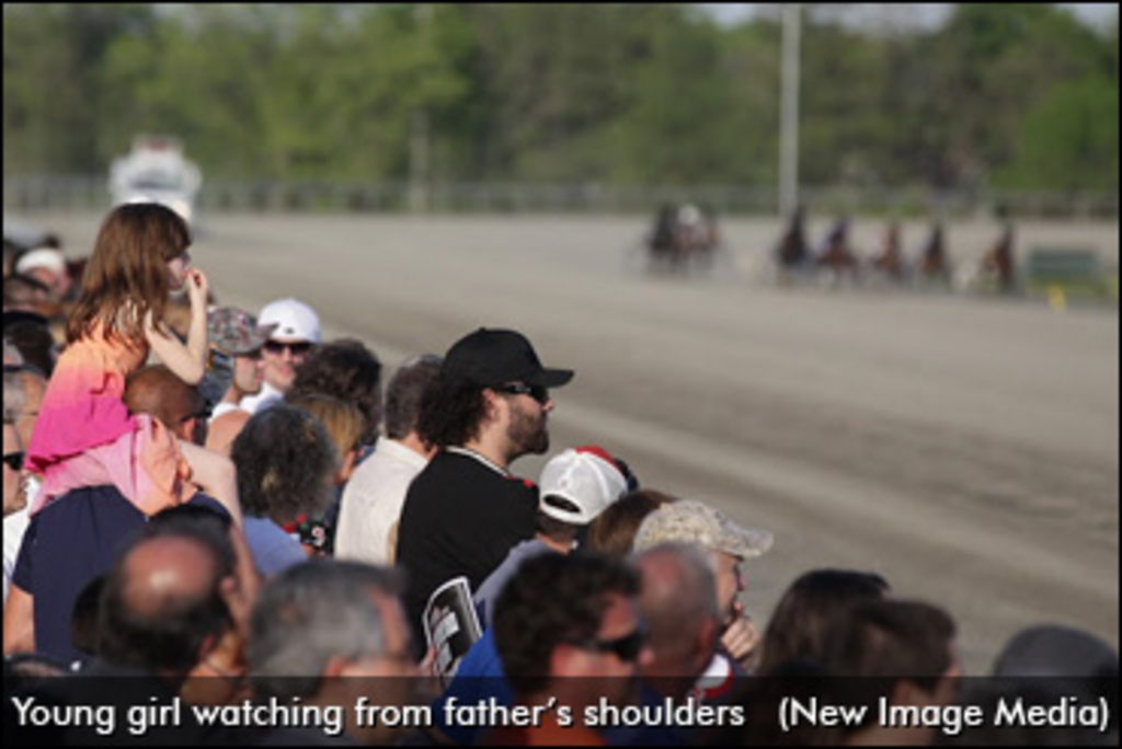 young-girl-watching-harness-racing-370.jpg