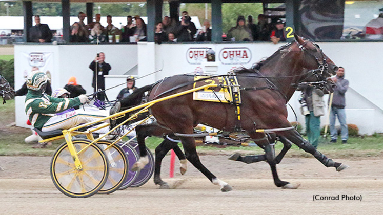 Lous Pearlman winning the Little Brown Jug at Delaware County Fairgrounds