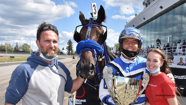 Pascal Berube in the winner's circle at Hippodrome 3R with Sylvain Tremblay and Emma Bouchard