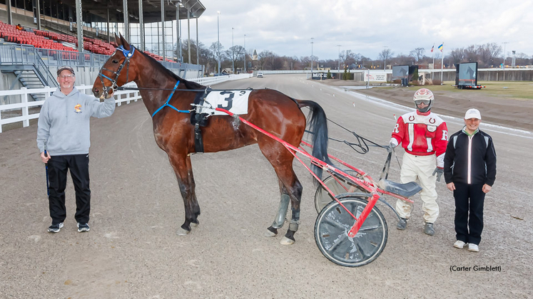 Scene A Magician in the The Raceway's winner's circle