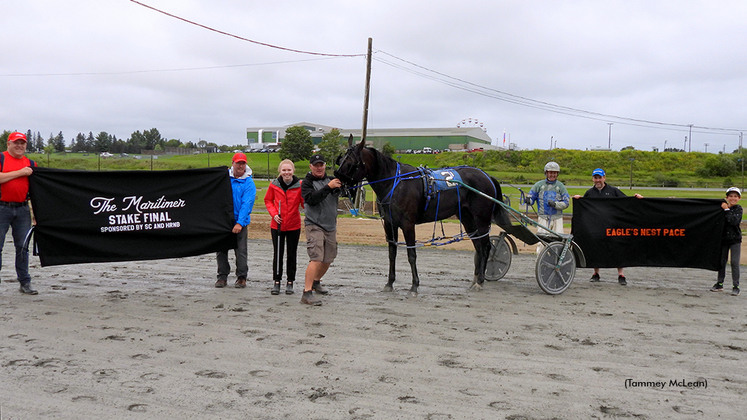 The Maritimer champion Our Girl Annie in the winner's circle