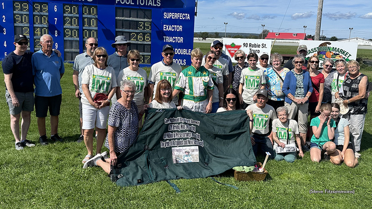 Clare MacDonald with family and friends at Truro Raceway, celebrating a day named in her honour