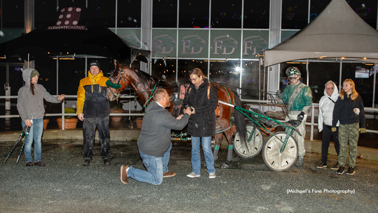 Chris Anderson proposes to Kristine MacKay in the Fraser Downs winner's circle