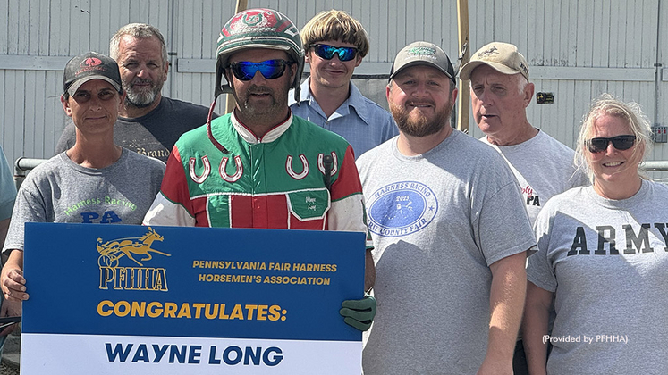 Wayne Long celebrates his 1,000th career driving win