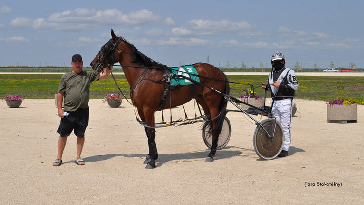 Grit N Grace in the winner's circle at The Loop